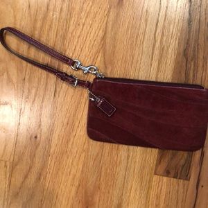 Beautiful shade of red coach wristlet